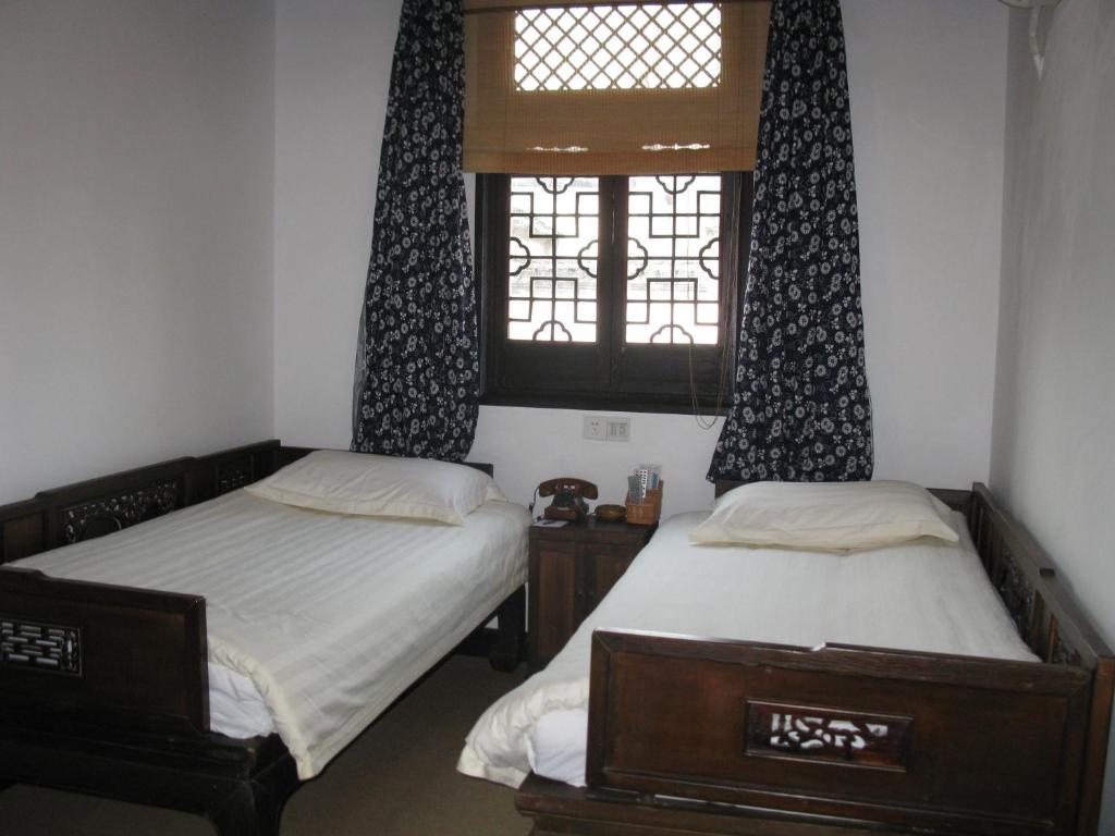 XI Di Travel Lodge Yi (Anhui) Chambre photo